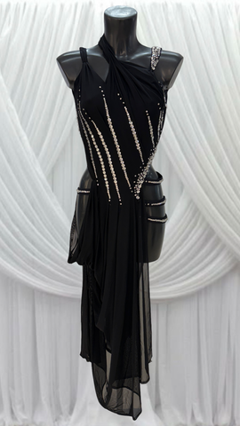 BLACK BODYSUIT WITH BLACK MESH DRAPE AND CRYSTAL DETAIL.